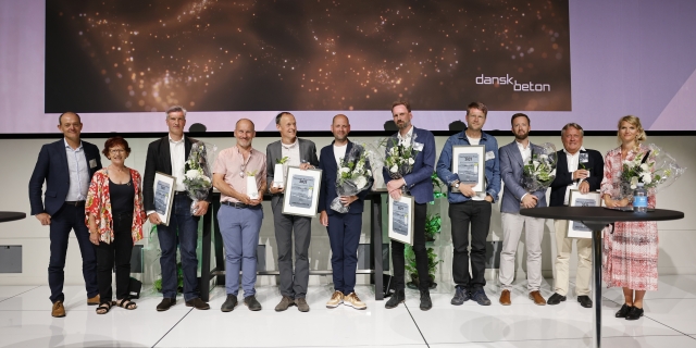 Photo: Judges Niels Søndergaard and Rie Øehlenschlæger and the project team behind Orientkaj Station. Photo by Torben Eskerod.